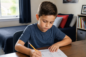 Student working through a challenging math problem.